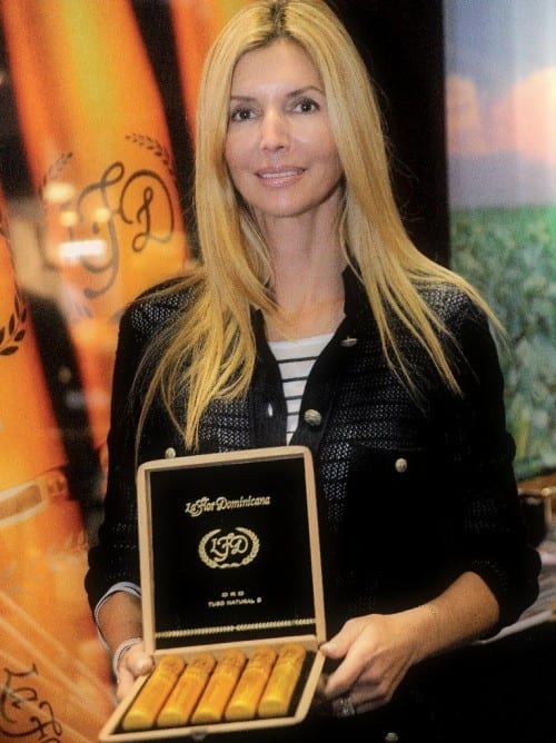ines lorenzo-gomez la flor dominicana sales operations florida portrait tubos oro