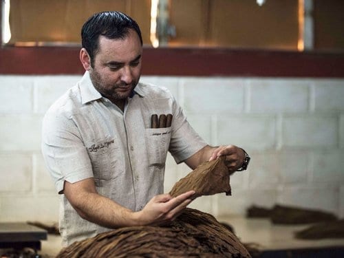 Oscar working at his factory