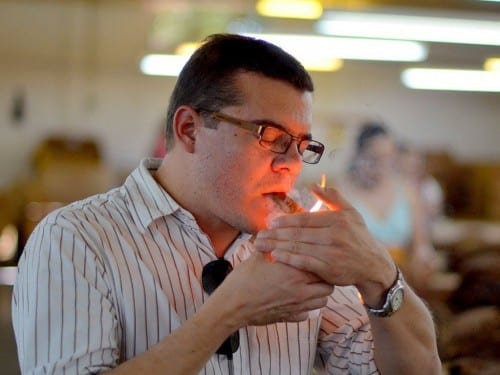 sergio torres rodriguez lights up a company own cigar plasencia factory